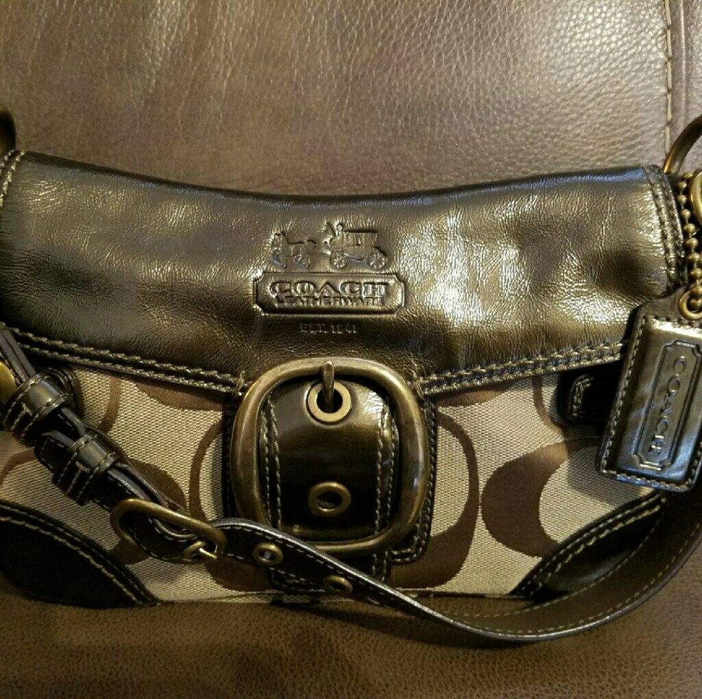 Coach purse in pristine condition brown bronze
